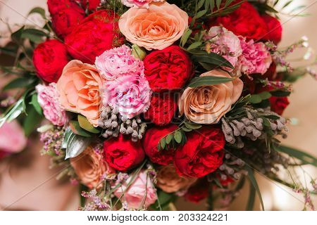 Bouquet of pion-shaped roses. Wedding decor. Close up shot