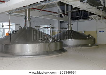 ST. PETERSBURG, RUSSIA - AUGUST 11, 2016: Brewing boilers in the Heineken brewery. It was the first Heineken brewery in Russia, and now it can produce over 5 millions HL of beer per year