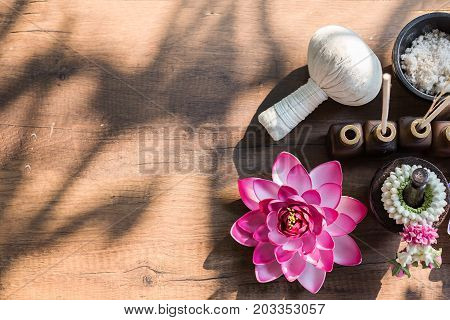 Spa massage compress balls herbal ball on the wooden with treaments spa Thailand select focus