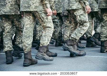 Military boots army walk the parade ground crop photo
