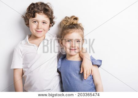 Happy Brother and Sister Hugging each other