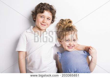 Happy Brother and Sister Hugging each other