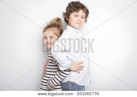 Happy Brother and Sister Hugging each other