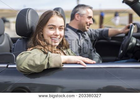 A Father On Car Journey With Teenage daughter