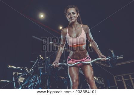 Sexy Athletic Young Girl Training Back In Gym