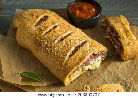 Homemade Cheesy And Meaty Italian Stromboli