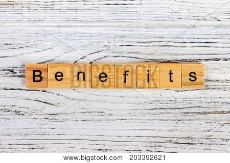 BENEFITS word made with building blocks. concept