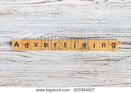 ADVERTISING word made with wooden blocks concept