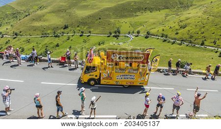 Col de PeyresourdeFrance- July 23 2014: BIC vehicle passing in the Publicity Caravn on the road to Col de Peyresourde in Pyrenees Mountains during the stage 17 of Le Tour de France 2014.