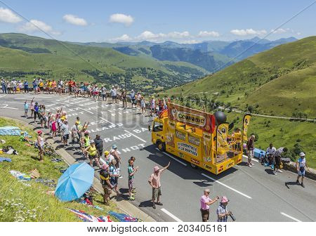 Col de PeyresourdeFrance- July 23 2014: BIC vehicle passing in the Publicity Caravn on the road to Col de Peyresourde in Pyrenees Mountains during the stage 17 of Le Tour de France 2014.