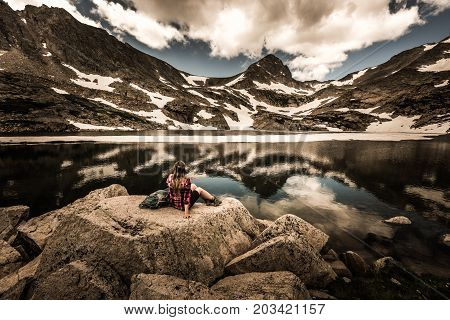 Tourist In Colorado Hiker Girl Rests At Blue Lake