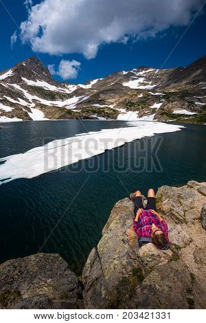 Tourist In Colorado Hiker Girl Rests At Blue Lake