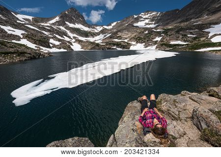 Tourist In Colorado Hiker Girl Rests At Blue Lake
