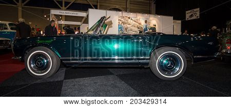 MAASTRICHT NETHERLANDS - JANUARY 08 2015: Car Mercedes-Benz 280SL (W113). International Exhibition InterClassics & Topmobiel 2015