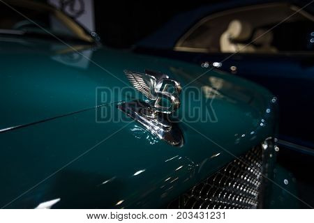 MAASTRICHT NETHERLANDS - JANUARY 08 2015: Hood ornament of a full-size luxury car Bentley Arnage. International Exhibition InterClassics & Topmobiel 2015