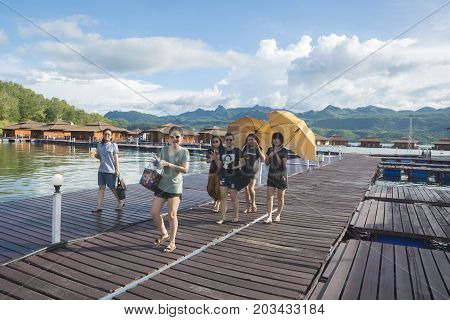 September 04, 2017 : Tourists  Walking On Wooden Raft In The Resort At Srinakarin Dam, Kanchanaburi,