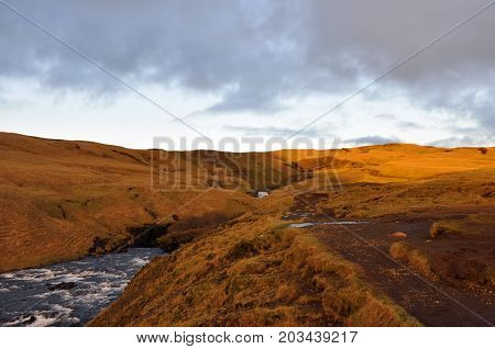 grass and rocks on a cloudy day in Iceland