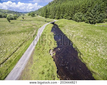 Aerial view of the street between Oban and Taynuilt next to the river Nell, Argyll, Scotland