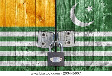 Azad Kashmir flag on door with padlock
