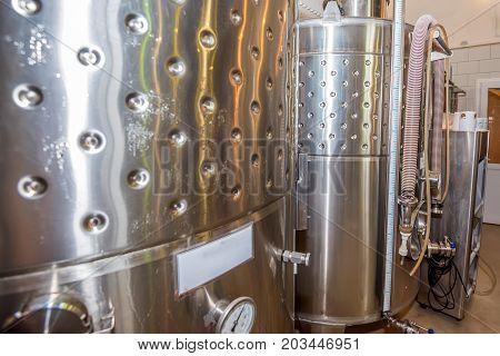 Modern winery plant with fermentaion stainless tanks for wine production