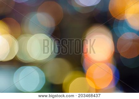 Defocused lights abstract colorful nonagon bokeh background