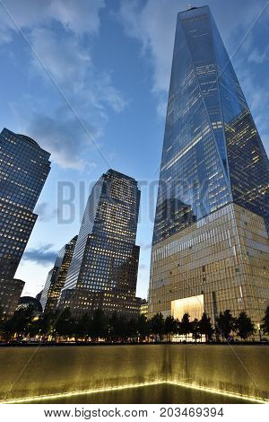 NEW YORK CITY - AUGUST 24: 9/11 Memorial at World Trade Center Ground Zero on August 24 2017 in New York City USA.