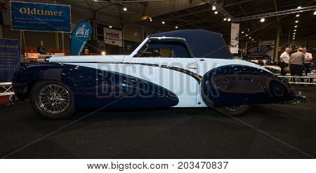 MAASTRICHT NETHERLANDS - JANUARY 09 2015: British two-door sports saloon Jaguar Mk IV 35 litre Drop Head Coupe Vanden Plas 1947. International Exhibition InterClassics & Topmobiel 2015