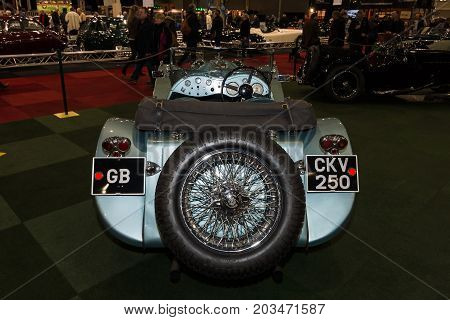MAASTRICHT NETHERLANDS - JANUARY 09 2015: A sports car Jaguar SS100 3.5 1937. Rear view. International Exhibition InterClassics & Topmobiel 2015