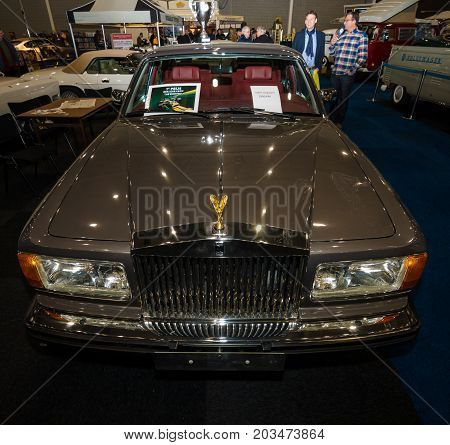 MAASTRICHT NETHERLANDS - JANUARY 09 2015: A Full-size luxury car Rolls-Royce Silver Spirit 1988. International Exhibition InterClassics & Topmobiel 2015