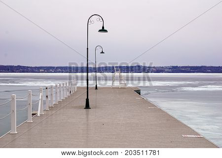 The dock in Wequetonsing, Michigan, during March, when ice still covers Little Traverse Bay.