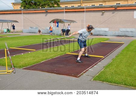 13.08.2017.Russia.Saint-Petersburg.Gorodki - a Russian folk sports game. In this game you need specific distances to smash figures made in different ways from five wooden cylinders.