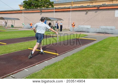 13.08.2017.Russia.Saint-Petersburg.Gorodki - a Russian folk sports game. In this game you need specific distances to smash figures made in different ways from five wooden cylinders.