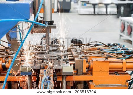 Industrial welding machines in the workshop in the process of work and movement