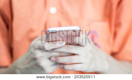 blurred of hands student testing exercise exams answer on tablet by finger clicking Concept Educational technology use physical hardware computer-based online learning technologies in school.