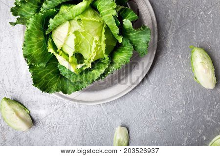 Fresh Green Cabbage In Metal Plate On Grey Background. Top View. Copy Space.