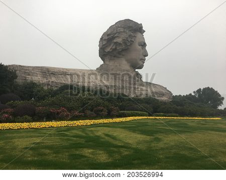 Changsha Hunan China , 1 February 2017 : Mao Zedong sculpture in orange Chau Tau island, Changsha City, Hunan Province, china