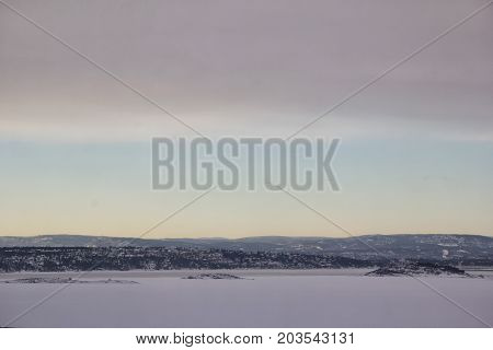 View of iced oslo fjord in winter day in norway
