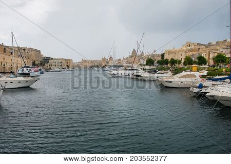 Boats And Yachts Anchoring In Valletta, Malta