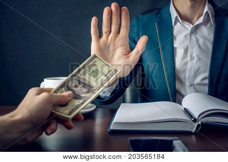 Man Businessman In Suit Refuses To Take The Money By Showing That He Is Not A Grafter. Concept Of Co