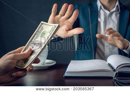 Man Businessman In Suit Refuses To Take The Money By Showing That He Is Not A Grafter. Concept Of Co