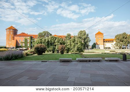 KRAKOW, POLAND - August 15, 2017: View on the inner courtyard of Wawel castle with garden and towers during the sunny morning in Krakow