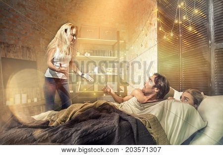 Wife finding husband in bed with an other woman
