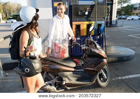 Man And Woman Motorcyclists Motorcycle On Station Young Couple Pertol Bike