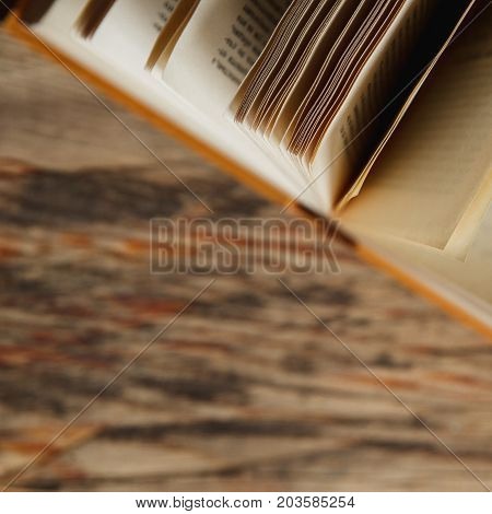 Open Vintage Book On Textured Wooden Surface. Autumn Mood Concept. Time To Read.