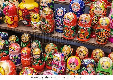 Matryoshka is a Russian wooden toy in the form of a painted doll, inside of which are similar dolls of smaller size