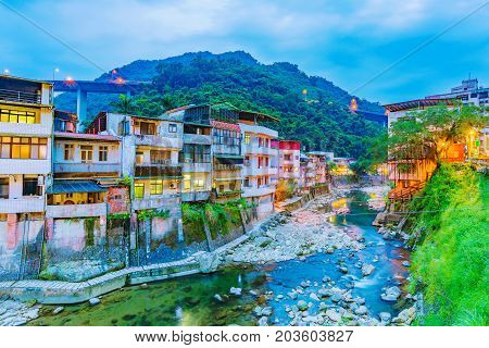 Shiding district river and old buildings at night