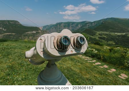 Republic of Armenia. Binocular viewer at Tatev. Photo in the daytime.