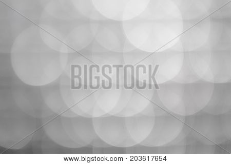 Gray abstract bokeh of light for background.