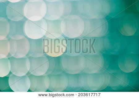 Green abstract bokeh of light for  background.