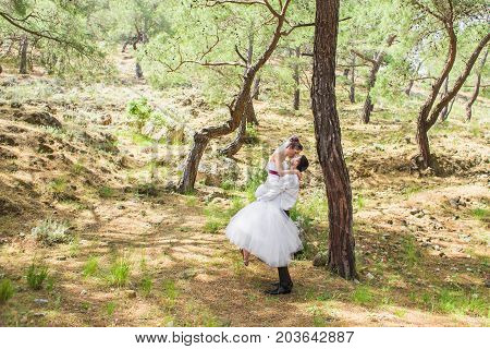 Romantic dating. Young loving couple embracing on nature.